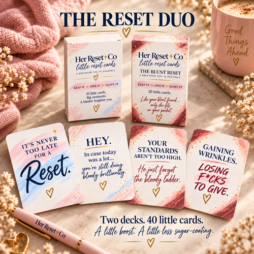 The Reset Duo: Original Reset and Blunt Reset boxes with two cards from each deck in a blush and cream setting